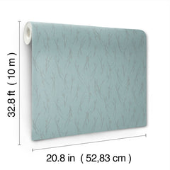 A roll of Sprigs Wallpaper by York Wallcoverings featuring a subtle branch pattern on a light blue background. The wallpaper measures 32.8 ft (10 m) in length and 20.8 in (52.83 cm) in width, as indicated by labels and measurement lines.