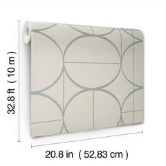Sun Circles Wallpaper by York Wallcoverings features a modern geometric circle pattern in light gray and comes in a roll measuring 32.8 feet (10 meters) long by 20.8 inches (52.83 cm) wide.