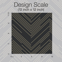 Featuring a square black design with thin, gold, chevron-like diagonal lines, the York Wallcoverings Polished Chevron Wallpaper displays a gray background accented with a lighter chevron line pattern. The sample measures 12x12 inches and includes axis labels showing inch measurements.