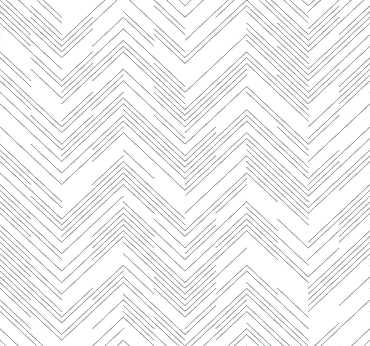The Polished Chevron Wallpaper by York Wallcoverings features black thin zigzag lines creating a repeating chevron pattern on a white background. This geometric, modern, and minimalistic design offers a clean and symmetrical appearance throughout the wallpaper.