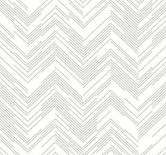 The Polished Chevron Wallpaper by York Wallcoverings features black thin zigzag lines creating a repeating chevron pattern on a white background. This geometric, modern, and minimalistic design offers a clean and symmetrical appearance throughout the wallpaper.