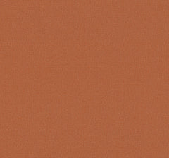 Close-up of York Wallcoverings’ Chevronette Wallpaper in vibrant orange, showcasing its subtly textured surface with a fine, diagonal weave pattern and a solid, uniformly distributed color.