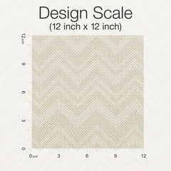 A 12 inch by 12 inch square sample of the Iconic Shades Wallpaper by York Wallcoverings is shown in a beige chevron knit pattern, with rulers on the left and bottom sides displaying inch measurements. The text “Design Scale (12 inch x 12 inch)” appears above.