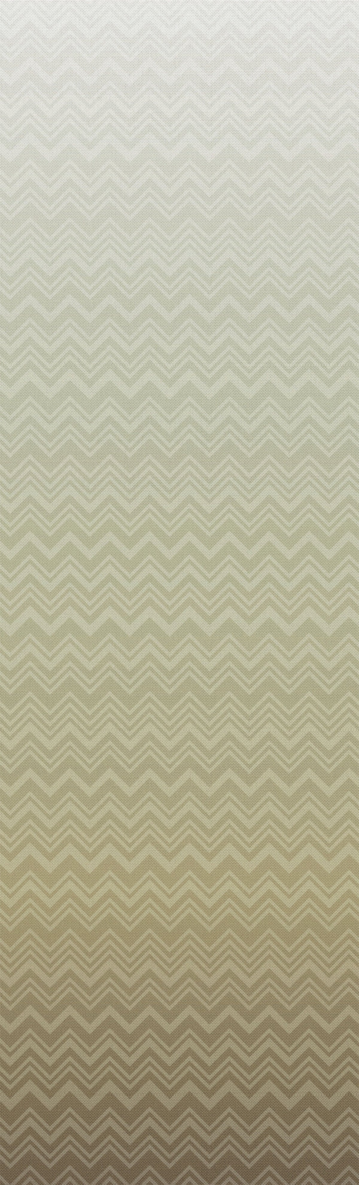 Featuring a light-to-dark gradient background with a repeating zigzag chevron pattern, the Iconic Shades Wallpaper by York Wallcoverings transitions from crisp white at the top to rich brown at the bottom, creating a subtle textured effect.