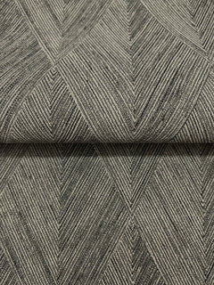 Magnolia Home Challenger Wallpaper in dark grey, featuring a repeating chevron or herringbone pattern created by fine vertical lines.