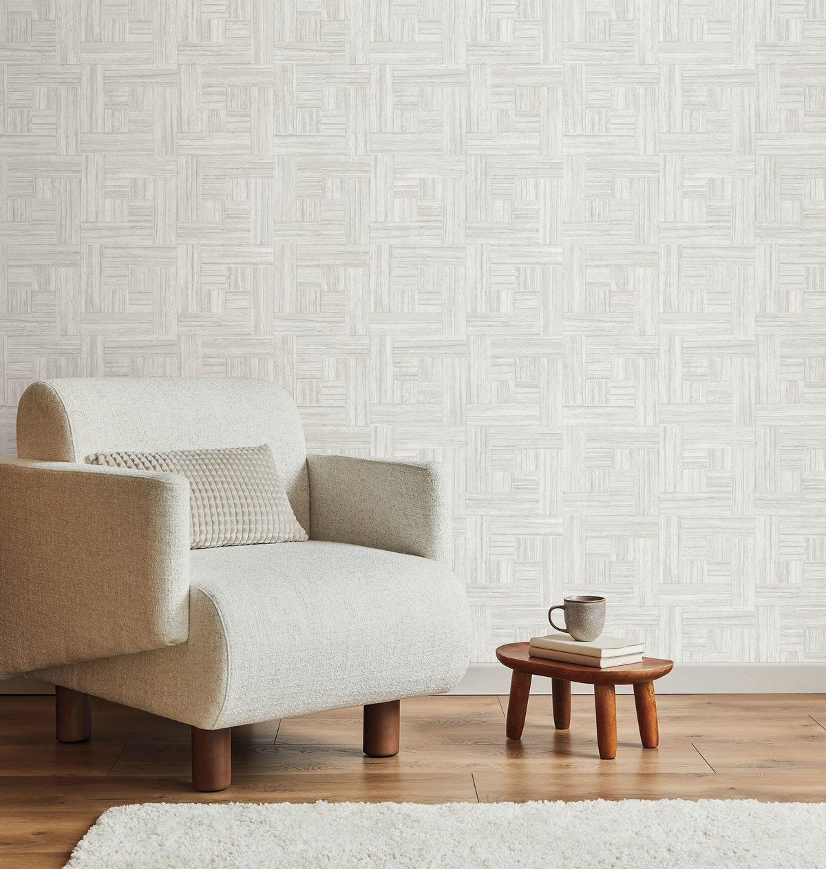 Tesselle Wallpaper featuring a light gray, geometric wood grain pattern arranged in alternating horizontal and vertical blocks.