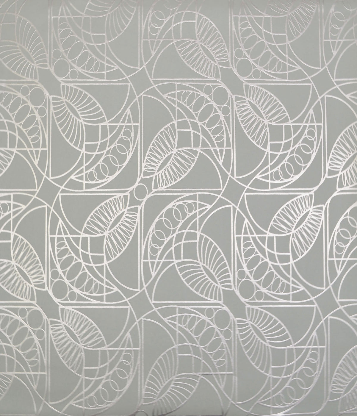 Cartouche Wallpaper featuring a repeating geometric pattern of white interlocking curved lines and stylized leaf shapes on a gray background.