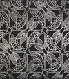 Cartouche Wallpaper featuring a black background with a repeating, geometric white line pattern of arched, leaf-like shapes and circles.