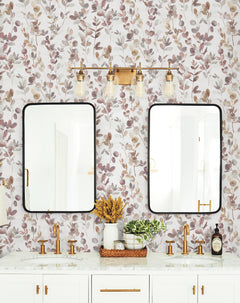Double bathroom vanity with two rectangular mirrors and a light fixture mounted over York Wallcoverings Candice Olson Joyful Eucalpytus Wallpaper.
