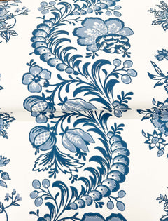 Beaumont Floral Stripe Wallpaper by York Wallcoverings features a blue floral and leaf pattern on a white background, with stylized flowers, leaves, and berries arranged in a flowing, decorative design.