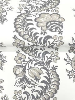 Beaumont Floral Stripe Wallpaper by York Wallcoverings features large, ornate black and gray botanical patterns with flowers, leaves, and berries set against a white background in a repeating design.