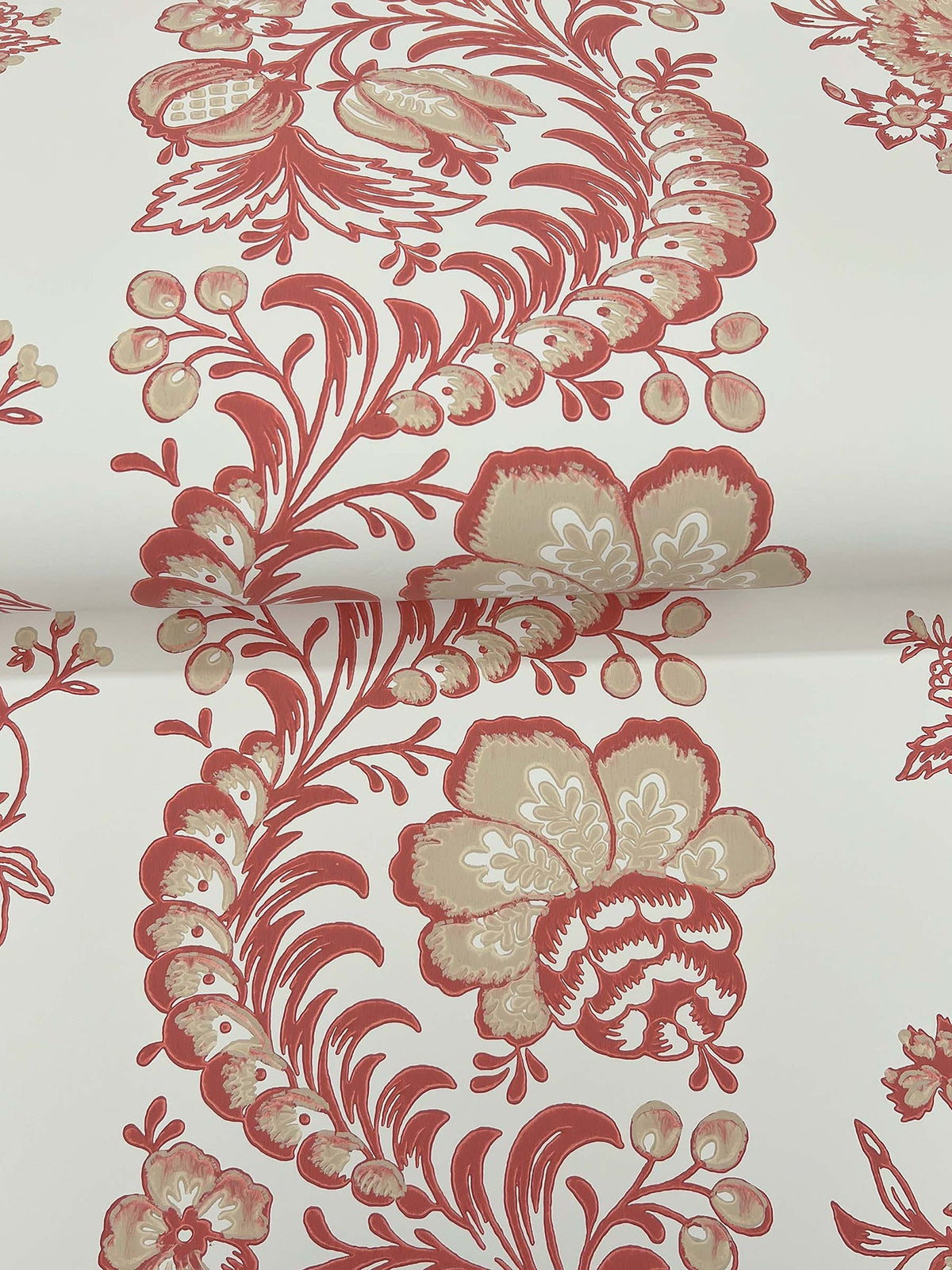 The Beaumont Floral Stripe Wallpaper by York Wallcoverings features red and beige floral and leaf motifs arranged in repeating stripes on a white background, with elegant swirling designs reminiscent of traditional vintage wallpaper.
