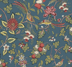 The Parterre Jacobean Wallpaper by York Wallcoverings showcases colorful birds perched on leafy branches, adorned with red, white, and yellow flowers and fruit clusters, all set against a muted blue background.