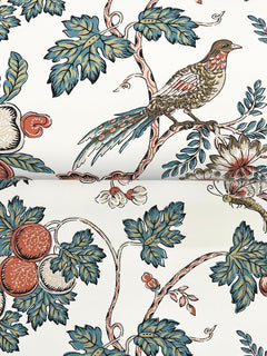Parterre Jacobean Wallpaper by York Wallcoverings features a bird perched on a branch with blue and green leaves, red berries, and floral elements set against a white background.