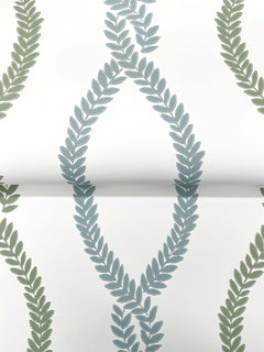 The Laureate Vine Trellis Wallpaper by York Wallcoverings features green and blue leafy vines arranged in repeating diamond and vertical patterns on a white background.