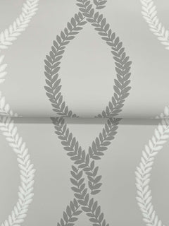 Laureate Vine Trellis Wallpaper by York Wallcoverings features a smooth gray background adorned with a repeating pattern of overlapping laurel wreaths in shades of gray and white, creating a diamond-like design.