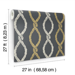 The Laureate Vine Trellis Wallpaper by York Wallcoverings features gold and cream leaf-like patterns on a dark background. Each roll measures 27 feet (8.23 m) in length and 27 inches (68.58 cm) in width.