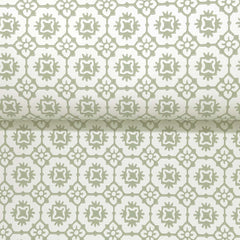 Priti Floral Grid Wallpaper by York Wallcoverings features a repeating geometric floral pattern in light green and white, with interlocking shapes and delicate flower-like motifs.