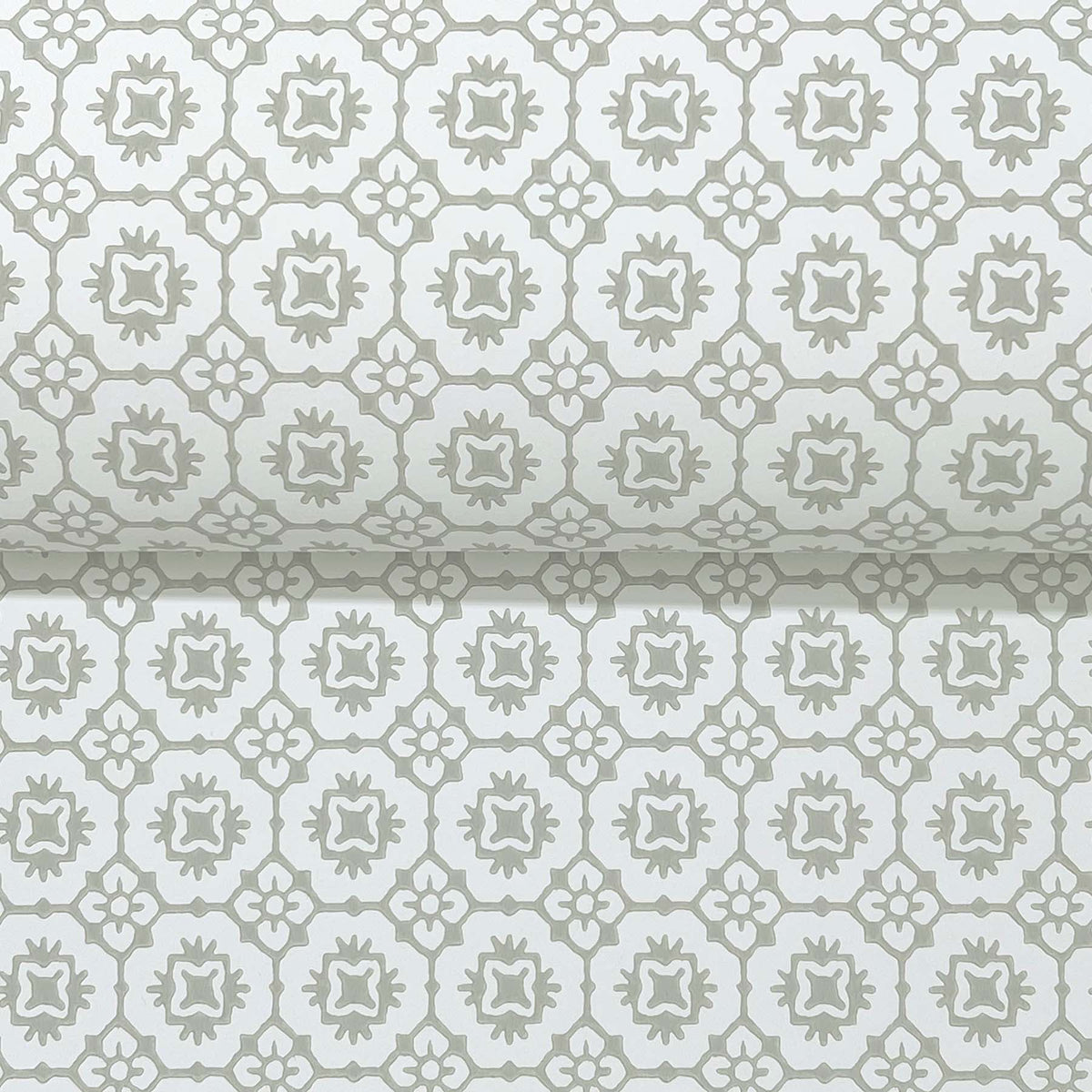 Introducing the Priti Floral Grid Wallpaper by York Wallcoverings, featuring a repeating geometric floral pattern in light grey on a white background. This design showcases interconnected shapes that create elegant, symmetrical motifs.