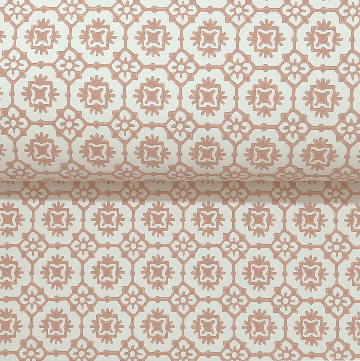 The Priti Floral Grid Wallpaper by York Wallcoverings features a repeating geometric floral pattern in muted pink on a light beige background, offering a vintage, decorative look.