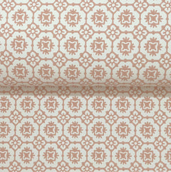 The Priti Floral Grid Wallpaper by York Wallcoverings features a repeating geometric floral pattern in muted pink on a light beige background, offering a vintage, decorative look.