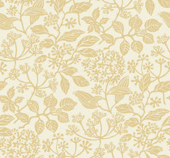 Rowen Botanical Wallpaper by York Wallcoverings features a beige and light tan floral pattern with detailed leaves, flowers, and branches, creating an elegant, seamless botanical design on a light cream background.