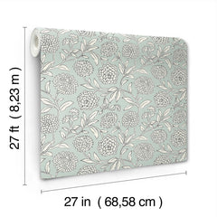 Chatsworth Garden Floral Trail Wallpaper by York Wallcoverings features white flowers and leaves on a light blue background. Each roll measures 27 feet (8.23 m) in length and 27 inches (68.58 cm) in width.