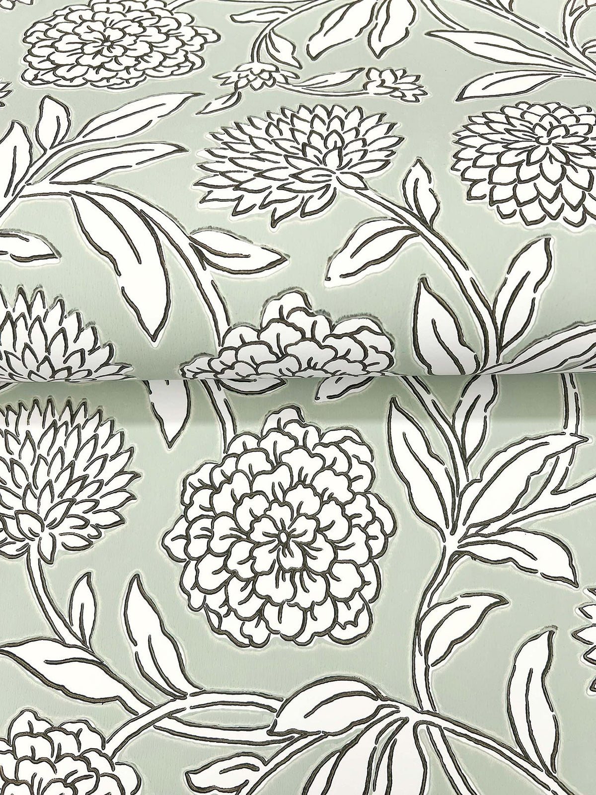 Chatsworth Garden Floral Trail Wallpaper by York Wallcoverings features a detailed floral pattern, with large, black-outlined blossoms and leafy stems repeating across a pale green background.