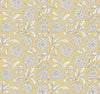Introducing the Chatsworth Garden Floral Trail Wallpaper by York Wallcoverings, featuring a seamless pattern of white outlined blooming flowers with intricate petals and leafy stems, all arranged in a decorative, repeating style on a mustard yellow background.
