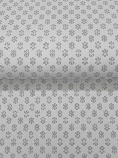 Brioni Floral Stamp Wallpaper by York Wallcoverings features a repeating pattern stamped across a gray background. The wallpaper is shown unrolled, displaying the uniform floral design across its entire surface.