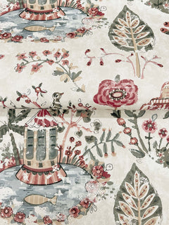 Parc Garden Dreams Wallpaper by York Wallcoverings features a vintage illustrated design with whimsical carousels, large leaves, and flowers in a soft palette of pink, green, and beige. The repeating pattern lends an enchanting charm to any space.