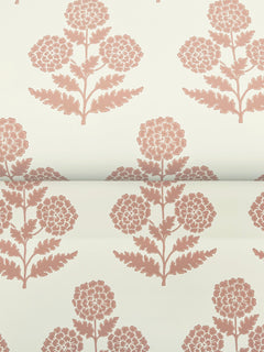 The Souci Marigolds Wallpaper by York Wallcoverings features a cream-colored background adorned with a repeating pattern of stylized pink marigold blossoms and leafy stems.