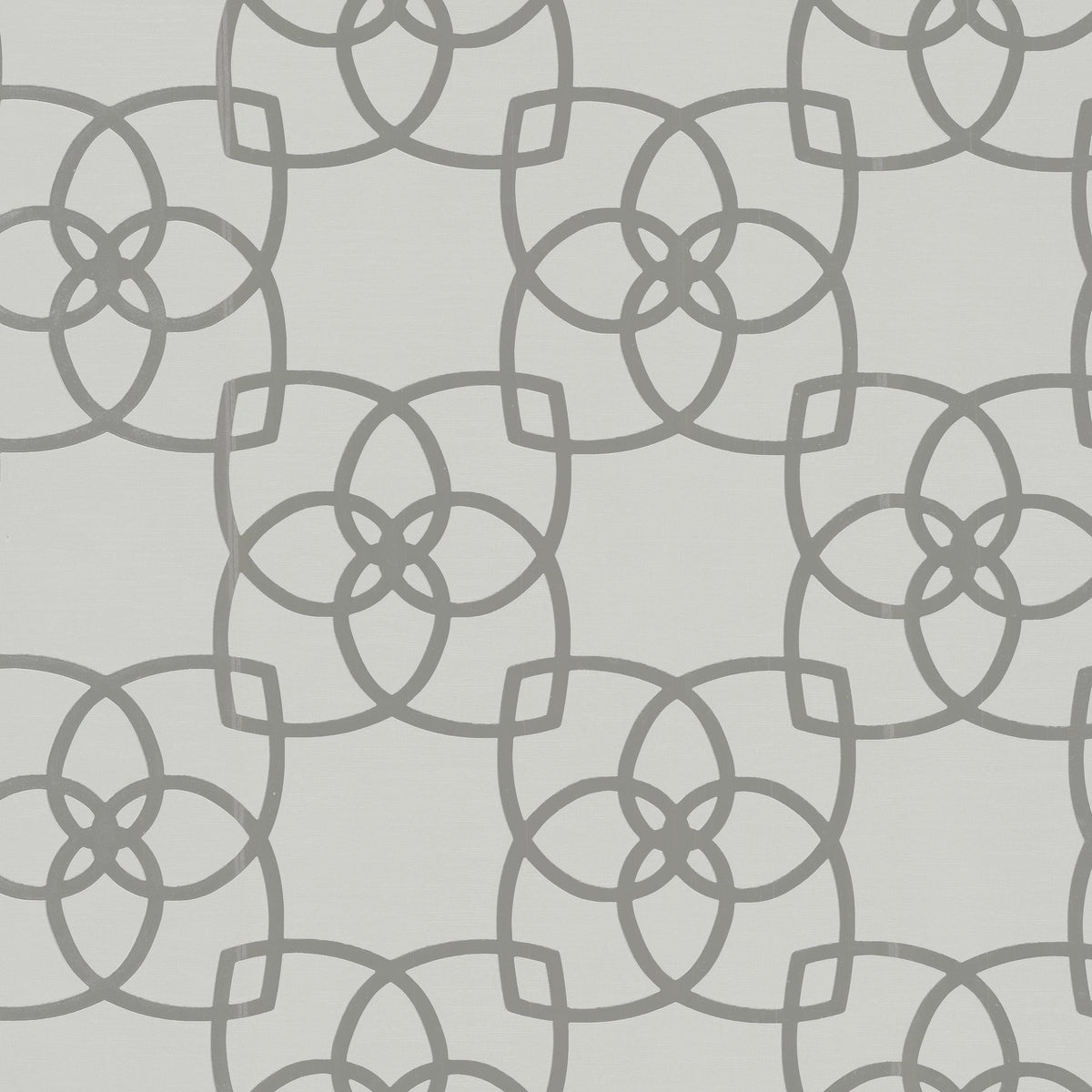 Featuring a modern and symmetrical design, the Serendipity Wallpaper by York Wallcoverings showcases a repeating geometric pattern of interlocking circles and curved lines in light gray on a white background.