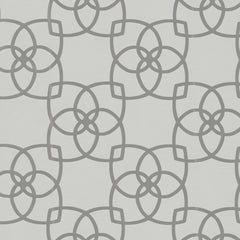 Featuring a modern and symmetrical design, the Serendipity Wallpaper by York Wallcoverings showcases a repeating geometric pattern of interlocking circles and curved lines in light gray on a white background.