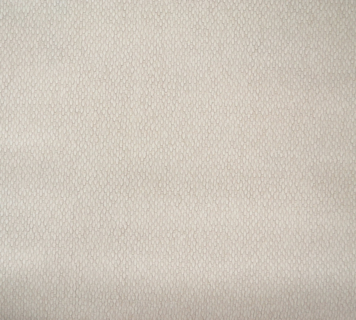 A close-up of the Stretched Hexagons Wallpaper by York Wallcoverings, featuring a light beige textured surface with a small, repeating hexagonal pattern that resembles subtle fabric or wallpaper design.